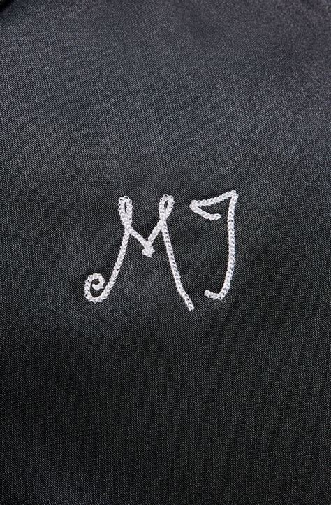 JORDAN Varsity Jacket FB5152 010 - Shiekh