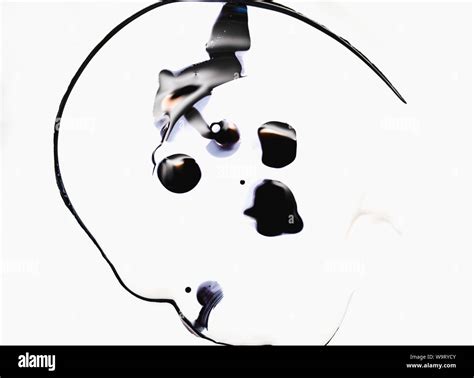 Mixing white and black paint, abstract pattern effect Stock Photo - Alamy