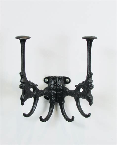 19th Century Cast Iron Wall Mounted Hat Rack With Gargoyles For Sale at ...