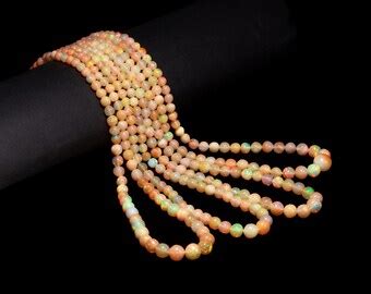 Buy Natural Gemstone Multi Fire Ethiopian Opal Smooth Heart Beads ...