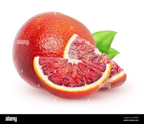 Isolated blood oranges. Whole red orange fruit and a pieces with leaves ...