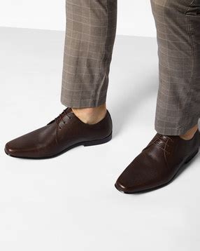 Men's Footwear: Buy Shoes, Sneakers, Flip Flops & Sandals at AJIO