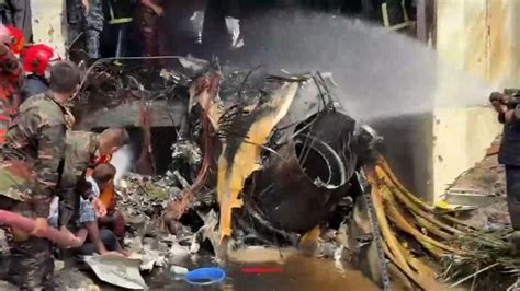 Bangladesh air force training jet crashes on college rooftop in Dhaka ...