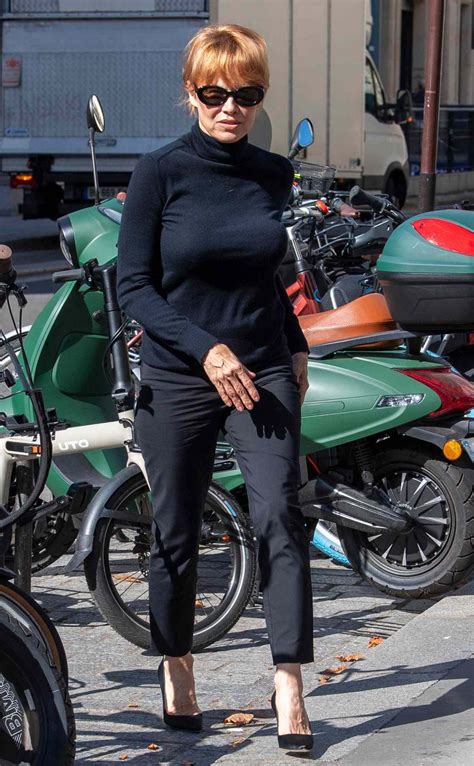 Pamela Anderson Channels Parisian Chic in Effortless Casual Style ...