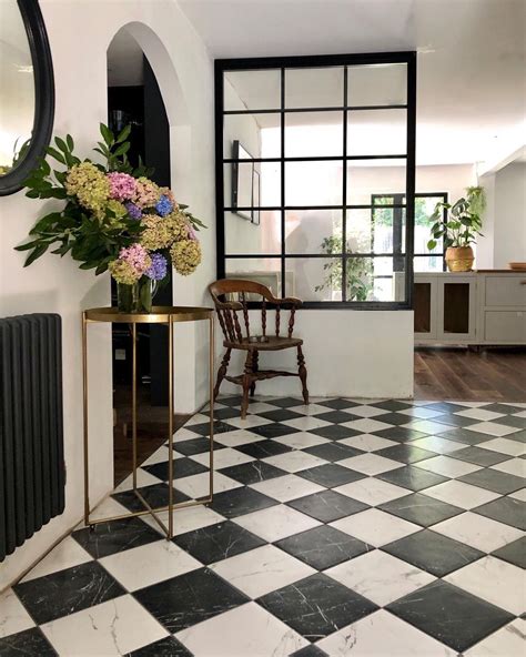 Black and White Checkered Floor Tile with Floral Decor