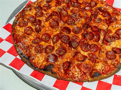 A.K. Pizza is hard to get—and even harder to beat - Review - Seattle ...