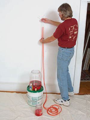 Using a Water Level for Foundation Work 的图像结果