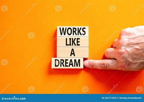 Works Like a Dream Symbol. Concept Words Works Like a Dream on Wooden ...