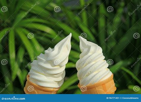 Cheers! with a Pair of Vanilla Soft Serve Ice Cream Cones in the ...