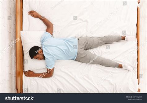 601 Man sleep on stomach Gambar, Foto Stok & Vektor | Shutterstock