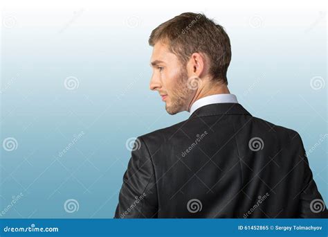 Businessman Looking Over His Shoulder Stock Image - Image of standing ...
