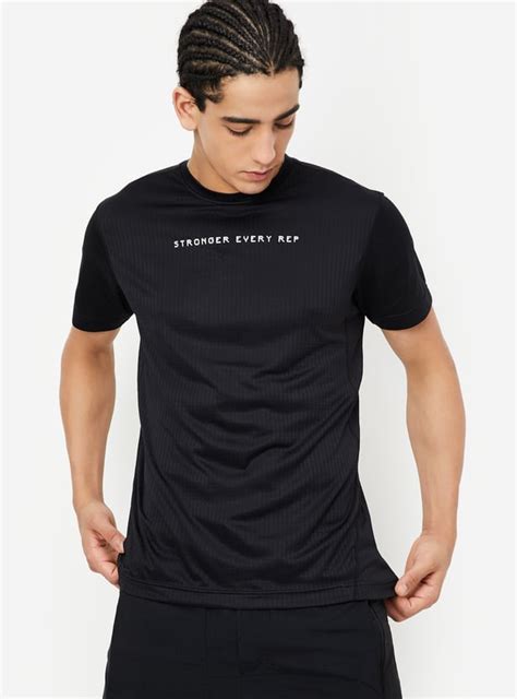 Buy Men Textured Sports T-shirt Online at just Rs. 699.0 ...