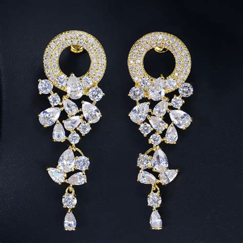 Heavy look gold plated drop style diamonds ear spike earring – ARISAA