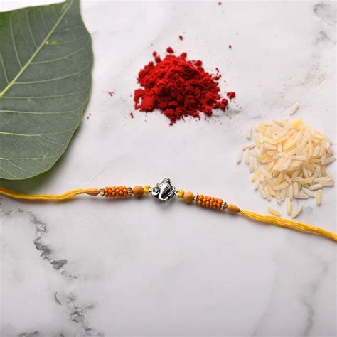 Rakhi Ganesh ji Face – VerveJewels