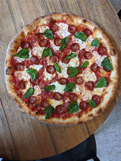 I haven't posted any round pies in a while... Here is a margherita with ...