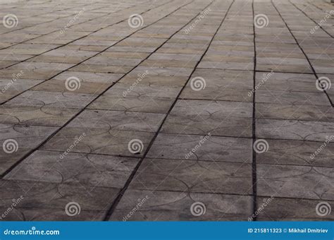 Gray Sidewalk in Tiles in a Receding Perspective Stock Image - Image of ...