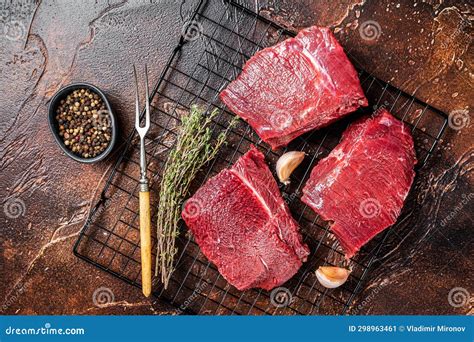 Raw Wild Game Meat of Venison Dear Ready for Cooking. Dark Background ...