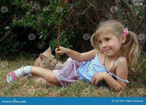 Child Play With Kitten Stock Photography - Image: 1221392