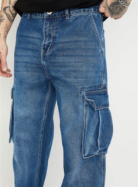 Buy Men Washed Loose Fit Cargo Jeans Online at just Rs. 1699.0 ...