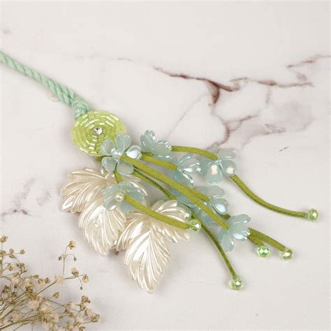 Buy Handmade Beaded Pearl Embellished Floral Lumba Rakhi For Bhabhi ...