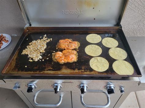 I bought a stainless steel griddle and seasoned it. My buddy told me my ...