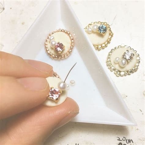 フルートのキーパッドのビジューピアス (PNK : S) F-007 Flute key pads pierced earrings with ...