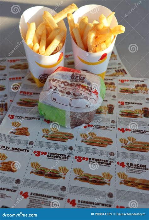 Wrapped Whopper Jr. and French Fries at BK Restaurant. Editorial Stock ...