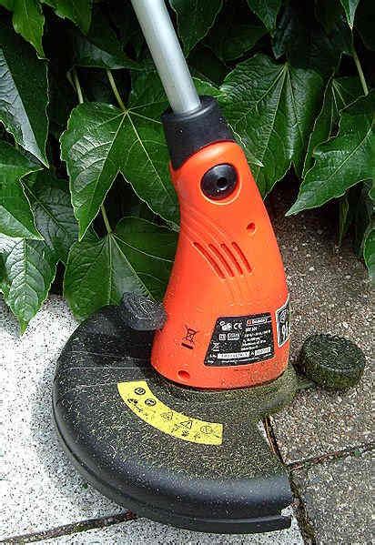 Image result for Loading a String Trimmer
