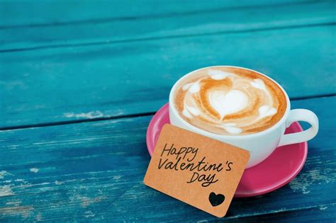 Close-up of coffee in cup with text on paper at table | Premium Photo