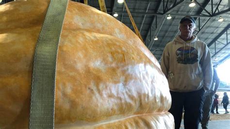 PHOTOS: Farmer sets new record with 2,147-pound pumpkin at state fair