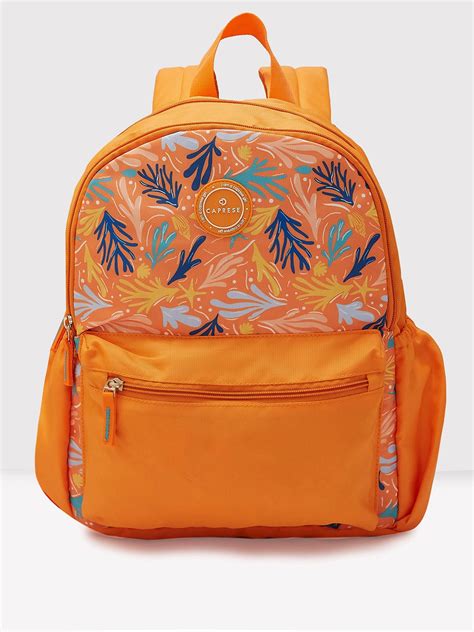 Buy Caprese Xenia Medium Orange Printed Backpack @ Rs.999 | Caprese Bags