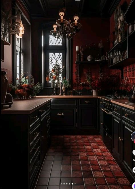 Gothic Kitchen Decor with Red Tile Floor and Black Cabinets
