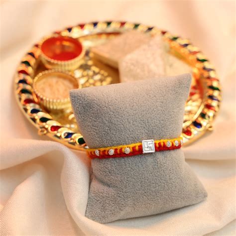 Traditional Swastik Silver Rakhi – Misvi