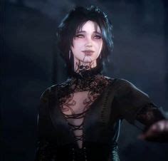 a woman with black hair and lace on her body in a dark room, looking at ...