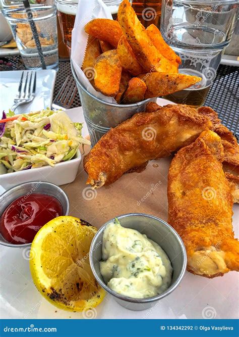 Fish and Chips with Coleslaw Salad, Tartar Sauce, Lemon and Ketchup ...