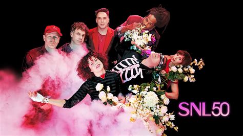 ARCADE FIRE LIGHTS UP "SNL" STAGE