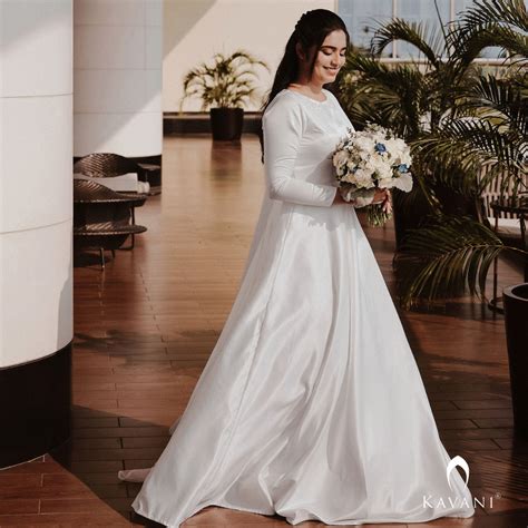 Our beautiful bride in her stunning looking satin aline gown and beaut ...