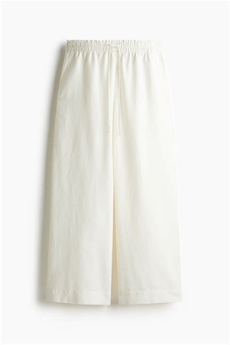 Cropped linen-blend trousers - White - Ladies | H&M IN