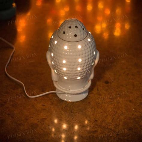 Buy Calm Ceramic Buddha Head Aroma Diffuser Online in India - Mypoojabox.in
