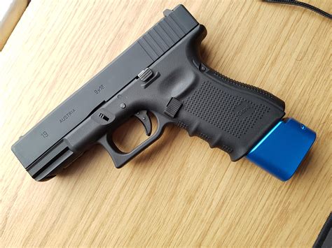Turns out real steel Glock mag extensions fit Airsoft Glocks. : r/airsoft