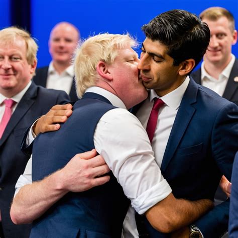 rishi sunak touching boris johnsons arse as he kisse...