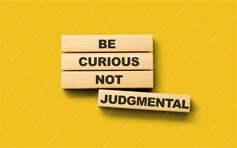 Wooden blocks be curious not judgmental word 3d illustration | Premium ...