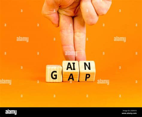 Gain or gap symbol. Concept words Gain Gap on wooden block. Beautiful ...