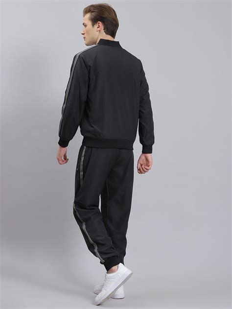 Buy Men Black Solid Mandarin Collar Full Sleeve Tracksuit Online in ...