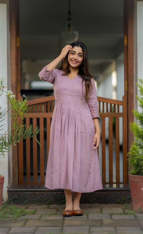 Mauve shaded cotton slub lining kurti with pleated yoke and embroidere ...