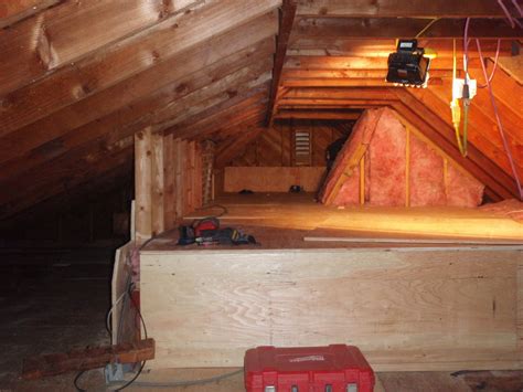 Home Pride Contracting: Installing plywood in an attic
