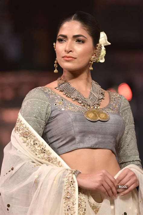 A model walks the ramp for Vikram Phadnis during the FDCI Make In India ...