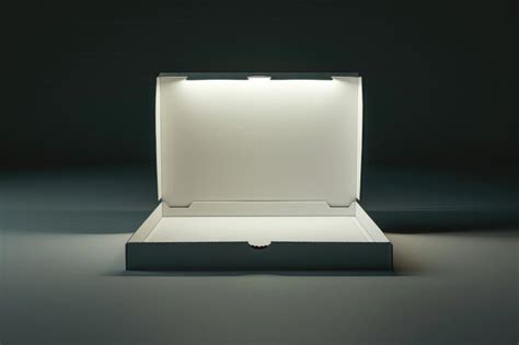 A small white box with a light source inside | Premium AI-generated image