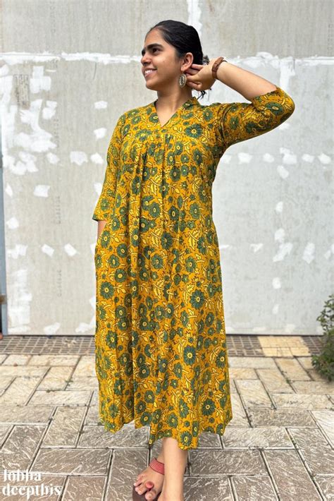 Florals on Turmeric Yellow Ajrakh Cotton Pleated Dress- Lobha Deepthis