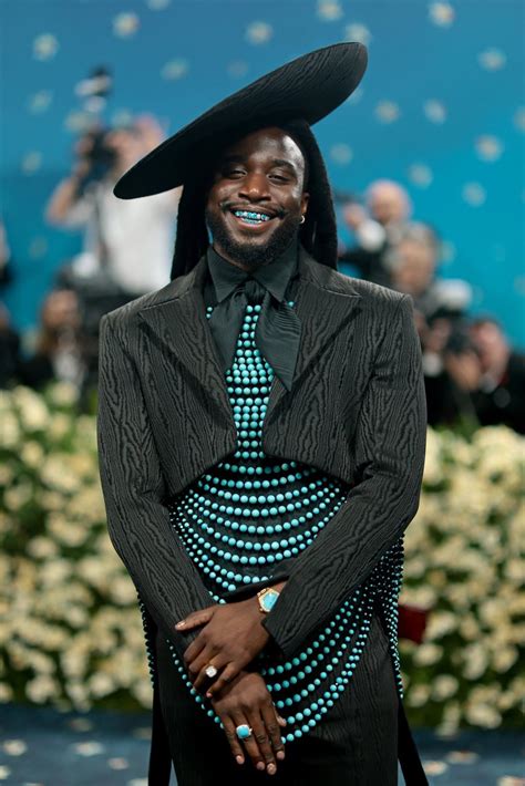 Shaboozey stuns in Turquoise Grillz & Beaded Suit for Met Gala Debut ...